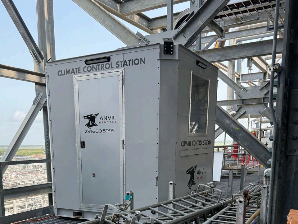 Anvil Rentals climate control station cube unit on an elevated industrial platform, with the unit logo and phone number visible on the side